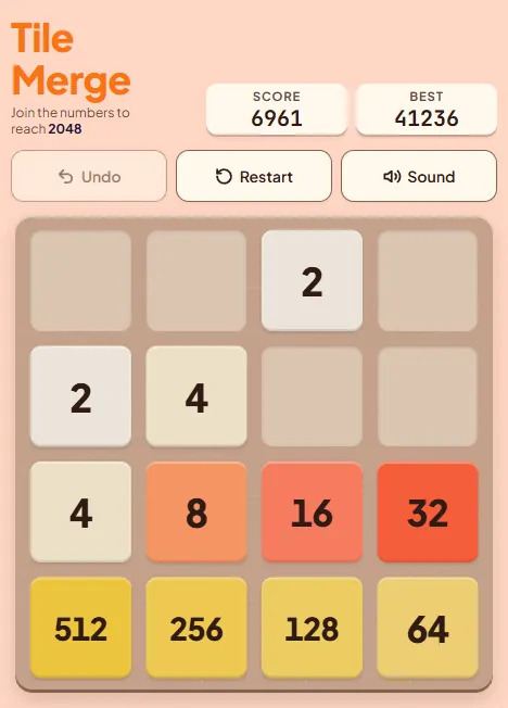 A well-organised Tile Merge board: bottom row 512, 256, 128, 64 from left to right, the row above 4, 8, 16, 32 so that 32 sits above 64, and a few small tiles on top